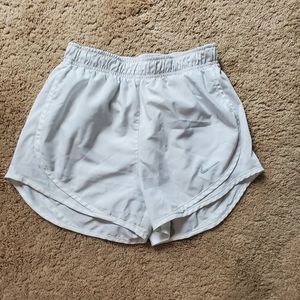 White Nike shorts